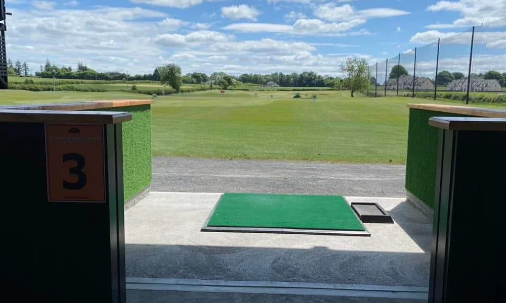 Golfer practicing at range